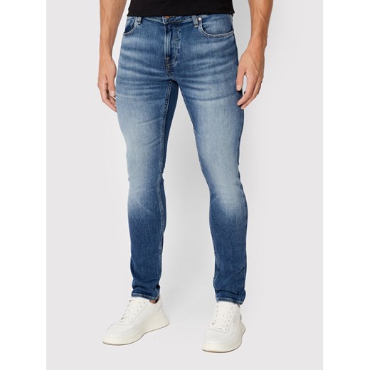 Guess Jeansy Chris M2YA27 D4Q42 Granatowy Super Skinny Fit ze sklepu MODIVO w kategorii Jeansy męskie - zdjęcie 182594180