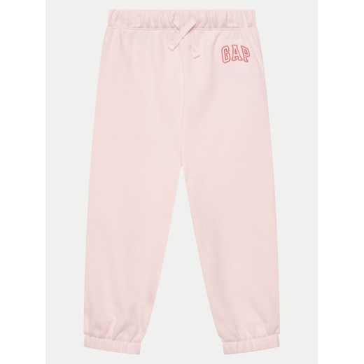 Gap Spodnie dresowe 743507-02 Różowy Relaxed Fit ze sklepu MODIVO w kategorii Spodnie dziewczęce - zdjęcie 182594772