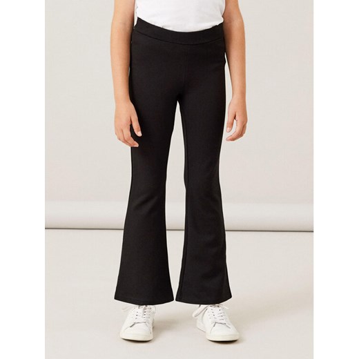 NAME IT Spodnie materiałowe 13177337 Czarny Bootcut Fit ze sklepu MODIVO w kategorii Spodnie dziewczęce - zdjęcie 182595152