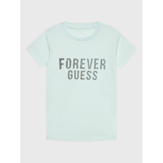 Guess T-Shirt K3RI05 K6YW3 Niebieski Regular Fit ze sklepu MODIVO w kategorii Bluzki dziewczęce - zdjęcie 182595460