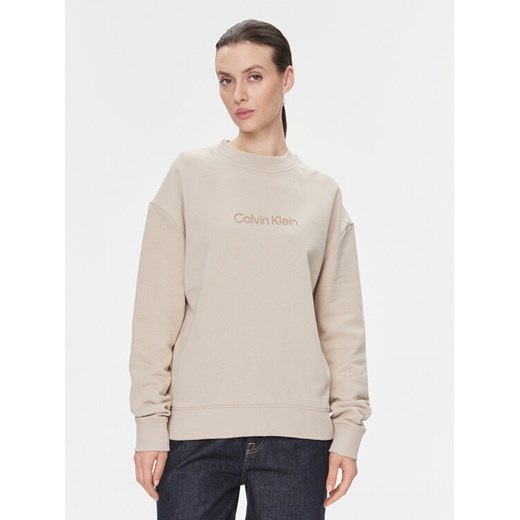Calvin Klein Bluza Hero Logo K20K205450 Beżowy Regular Fit ze sklepu MODIVO w kategorii Bluzy damskie - zdjęcie 182595613