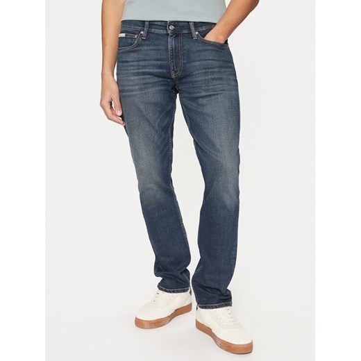 Calvin Klein Jeans Jeansy J30J326518 Granatowy Slim Fit ze sklepu MODIVO w kategorii Jeansy męskie - zdjęcie 182596161