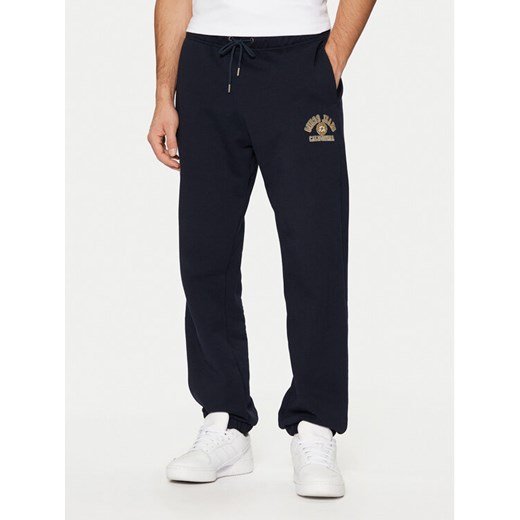 Guess Jeans Spodnie dresowe M5RB52 KCPR1 Granatowy Regular Fit ze sklepu MODIVO w kategorii Spodnie męskie - zdjęcie 182596302