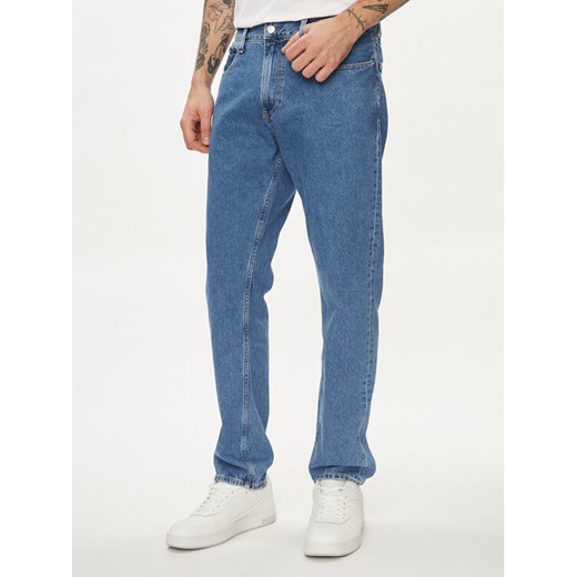 Calvin Klein Jeans Jeansy Authentic J30J324814 Niebieski Straight Fit ze sklepu MODIVO w kategorii Jeansy męskie - zdjęcie 182596321