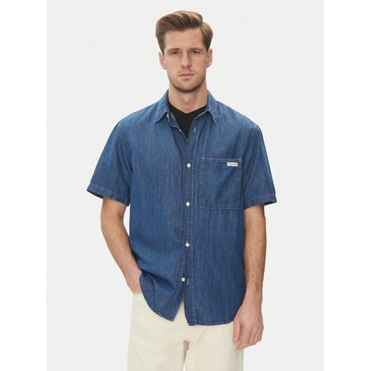 Calvin Klein Jeans Koszula jeansowa J30J327178 Niebieski Regular Fit ze sklepu MODIVO w kategorii Koszule męskie - zdjęcie 182596884