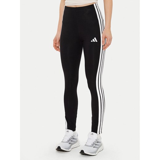adidas Legginsy Essentials 3-Stripes JE0072 Czarny Slim Fit ze sklepu MODIVO w kategorii Spodnie damskie - zdjęcie 182597041