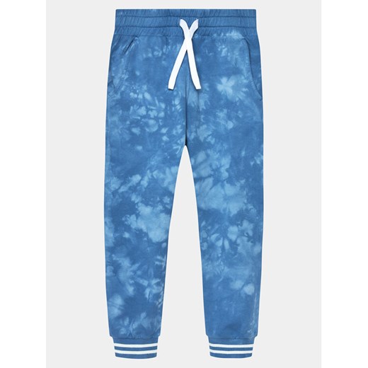 United Colors Of Benetton Spodnie dresowe 3EM5CF04V Niebieski Regular Fit ze sklepu MODIVO w kategorii Spodnie chłopięce - zdjęcie 182598700