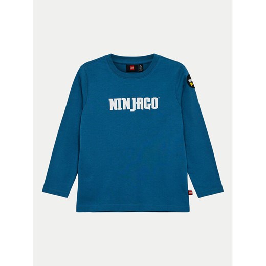 LEGO Bluzka Ninjago 12011275 Niebieski Regular Fit ze sklepu MODIVO w kategorii T-shirty chłopięce - zdjęcie 182599130