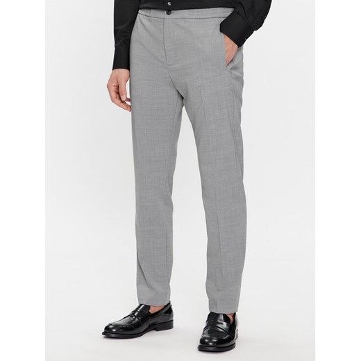 Tommy Hilfiger Spodnie materiałowe Dc Chelsea Po Travel Wool MW0MW33930 Szary Regular Fit ze sklepu MODIVO w kategorii Spodnie męskie - zdjęcie 182599940