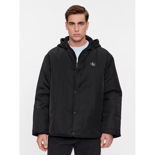 Calvin Klein Jeans Kurtka przejściowa Skater Hooded Jacket J30J325290 Czarny Regular Fit ze sklepu MODIVO w kategorii Kurtki męskie - zdjęcie 182600943