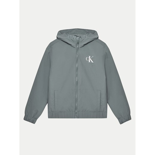 Calvin Klein Jeans Kurtka przejściowa Essential IB0IB02500 Zielony Regular Fit ze sklepu MODIVO w kategorii Kurtki chłopięce - zdjęcie 182601671