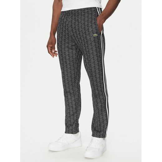 Lacoste Spodnie dresowe XH1440 Szary Regular Fit ze sklepu MODIVO w kategorii Spodnie męskie - zdjęcie 182601811