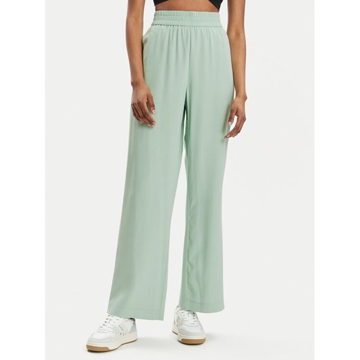 Vero Moda Spodnie materiałowe Carmen 10278926 Zielony Wide Leg ze sklepu MODIVO w kategorii Spodnie damskie - zdjęcie 182602702