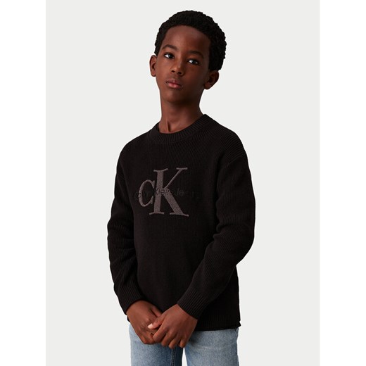 Calvin Klein Jeans Sweter Towelling Ck IB0IB02219 Czarny Regular Fit ze sklepu MODIVO w kategorii Swetry chłopięce - zdjęcie 182603300