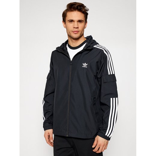 adidas Wiatrówka adicolor Classics 3-Stripes GN3475 Czarny Regular Fit ze sklepu MODIVO w kategorii Kurtki męskie - zdjęcie 182603503