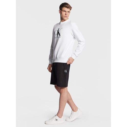 Calvin Klein Jeans Szorty sportowe J30J322914 Czarny Regular Fit ze sklepu MODIVO w kategorii Spodenki męskie - zdjęcie 182604874