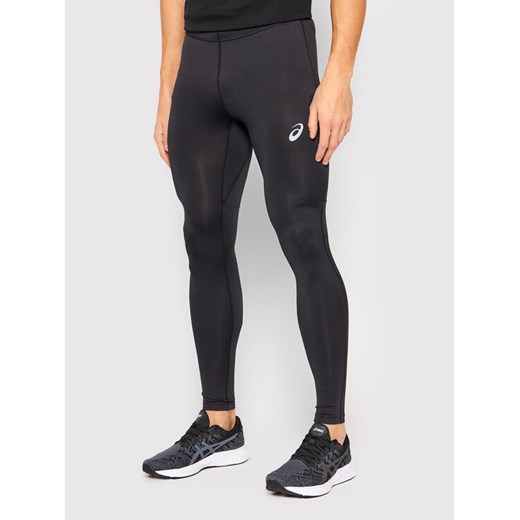 Asics Legginsy Core Tight 2011C345 Czarny Slim Fit ze sklepu MODIVO w kategorii Spodnie damskie - zdjęcie 182605120