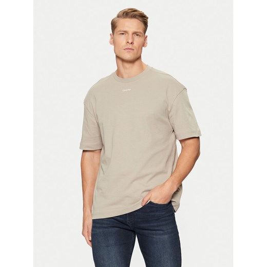 Calvin Klein T-Shirt Nano Logo Interlock T-Shirt K10K112487 Beżowy Regular Fit ze sklepu MODIVO w kategorii T-shirty męskie - zdjęcie 182605601
