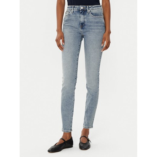 Tommy Hilfiger Jeansy Como WW0WW43717 Niebieski Skinny Fit ze sklepu MODIVO w kategorii Jeansy damskie - zdjęcie 182607931
