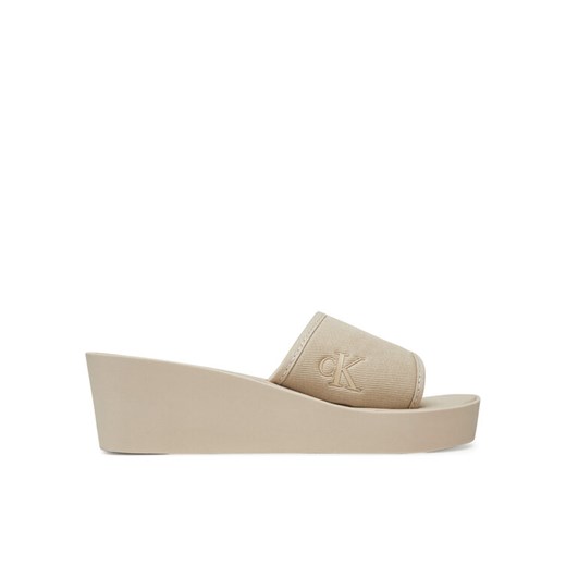 Calvin Klein Jeans Klapki Beach Wedge Slide Canvas YW0YW01725 Beżowy ze sklepu MODIVO w kategorii Klapki damskie - zdjęcie 182608080