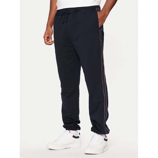 Tommy Hilfiger Spodnie dresowe MW0MW37477 Granatowy Regular Fit ze sklepu MODIVO w kategorii Spodnie męskie - zdjęcie 182609300