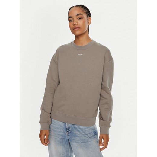 Calvin Klein Bluza Nano Logo K20K208329 Beżowy Regular Fit ze sklepu MODIVO w kategorii Bluzy damskie - zdjęcie 182610391