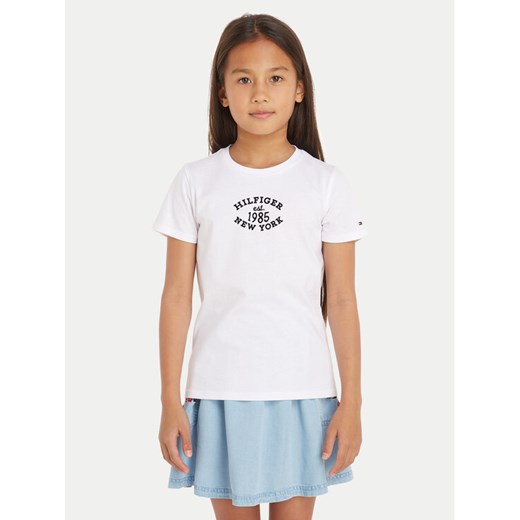 Tommy Hilfiger T-Shirt Monotype KG0KG08061 Biały Regular Fit ze sklepu MODIVO w kategorii Bluzki dziewczęce - zdjęcie 182611260