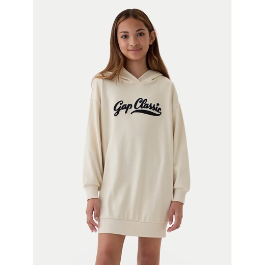 Gap Sukienka dzianinowa 526055-03 Beżowy Regular Fit ze sklepu MODIVO w kategorii Sukienki dziewczęce - zdjęcie 182612220