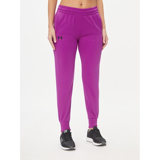 Under Armour Spodnie dresowe Armour Fleece Jogger 1373054 Fioletowy Loose Fit ze sklepu MODIVO w kategorii Spodnie damskie - zdjęcie 182613931