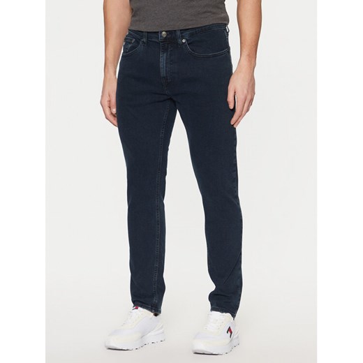 Tommy Jeans Jeansy Austin DM0DM21071 Granatowy Slim Fit ze sklepu MODIVO w kategorii Jeansy męskie - zdjęcie 182614552