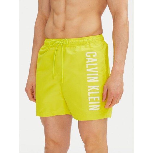 Calvin Klein Swimwear Szorty kąpielowe KM0KM01092 Żółty Regular Fit ze sklepu MODIVO w kategorii Kąpielówki - zdjęcie 182614970