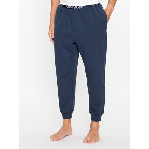 Calvin Klein Underwear Spodnie piżamowe 000NM2175E Niebieski Regular Fit ze sklepu MODIVO w kategorii Piżamy męskie - zdjęcie 182616542