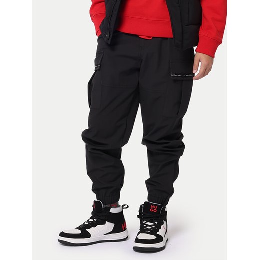 Hugo Spodnie materiałowe G00176 D Czarny Loose Fit ze sklepu MODIVO w kategorii Spodnie chłopięce - zdjęcie 182616772