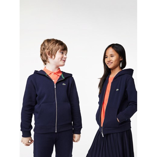 Lacoste Bluza SJ9723 Granatowy Regular Fit ze sklepu MODIVO w kategorii Bluzy chłopięce - zdjęcie 182616831