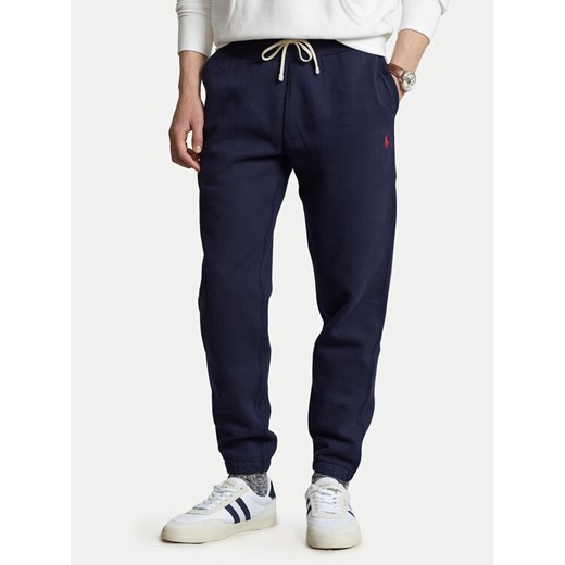 Polo Ralph Lauren Spodnie dresowe 710793939003 Granatowy Relaxed Fit ze sklepu MODIVO w kategorii Spodnie męskie - zdjęcie 182617571