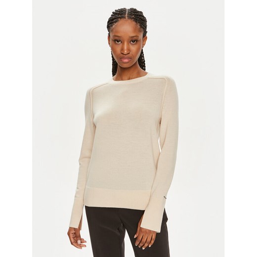 Calvin Klein Sweter K20K207575 Beżowy Regular Fit ze sklepu MODIVO w kategorii Swetry damskie - zdjęcie 182618521