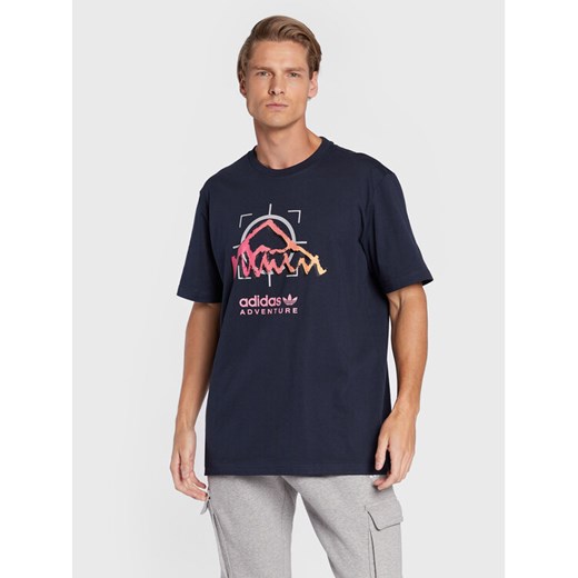 adidas T-Shirt Adventure Ride HK4981 Granatowy Relaxed Fit ze sklepu MODIVO w kategorii T-shirty męskie - zdjęcie 182618901