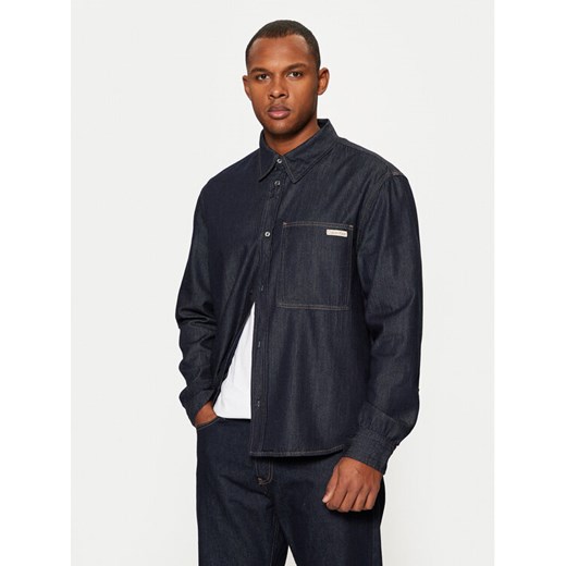 Calvin Klein Jeans Koszula jeansowa J30J326584 Granatowy Regular Fit ze sklepu MODIVO w kategorii Koszule męskie - zdjęcie 182619653