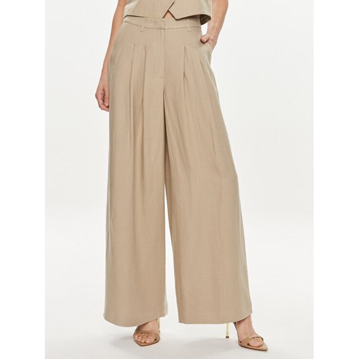 Herskind Spodnie materiałowe Lotus 5114840 Beżowy Relaxed Fit ze sklepu MODIVO w kategorii Spodnie damskie - zdjęcie 182620640