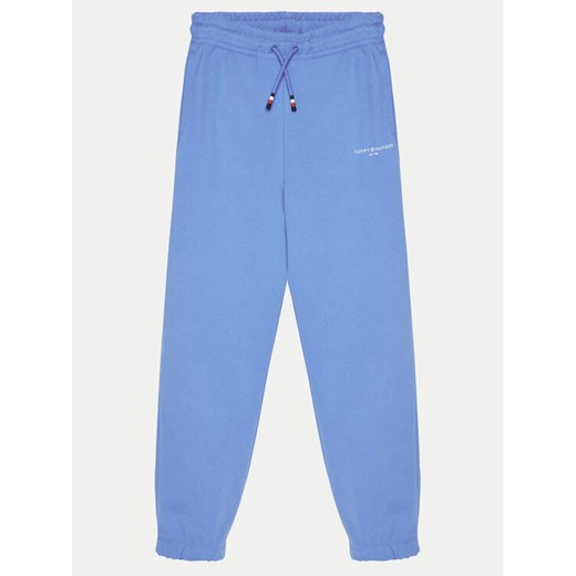 Tommy Hilfiger Spodnie dresowe KS0KS00596 Niebieski Regular Fit ze sklepu MODIVO w kategorii Spodnie chłopięce - zdjęcie 182620831