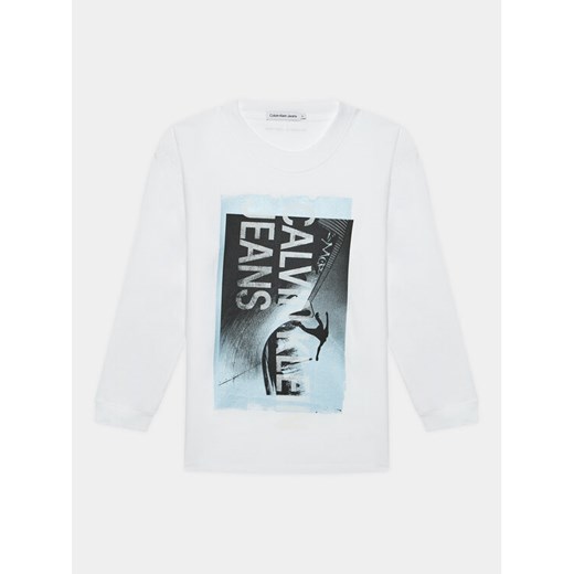 Calvin Klein Jeans Bluzka Photograph IB0IB01987 Biały Loose Fit ze sklepu MODIVO w kategorii T-shirty chłopięce - zdjęcie 182620832