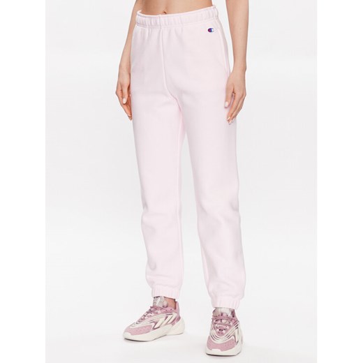 Champion Spodnie dresowe 116243 Różowy Regular Fit ze sklepu MODIVO w kategorii Spodnie damskie - zdjęcie 182621130