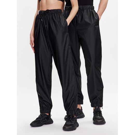 Rains Spodnie materiałowe 18560 Czarny Comfortable Fit ze sklepu MODIVO w kategorii Spodnie damskie - zdjęcie 182621493