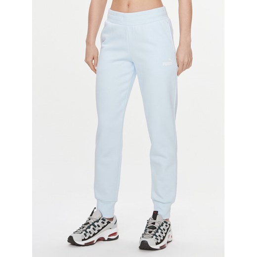 Puma Spodnie dresowe Ess 586841 Niebieski Regular Fit ze sklepu MODIVO w kategorii Spodnie damskie - zdjęcie 182622624