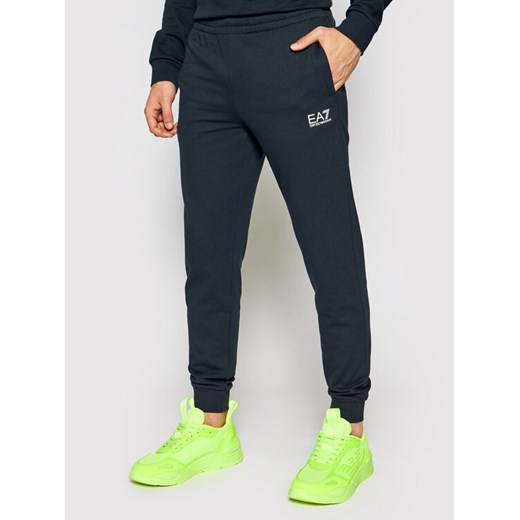 EA7 Emporio Armani Spodnie dresowe 8NPP53 PJ05Z 1578 Granatowy Slim Fit ze sklepu MODIVO w kategorii Spodnie męskie - zdjęcie 182623150
