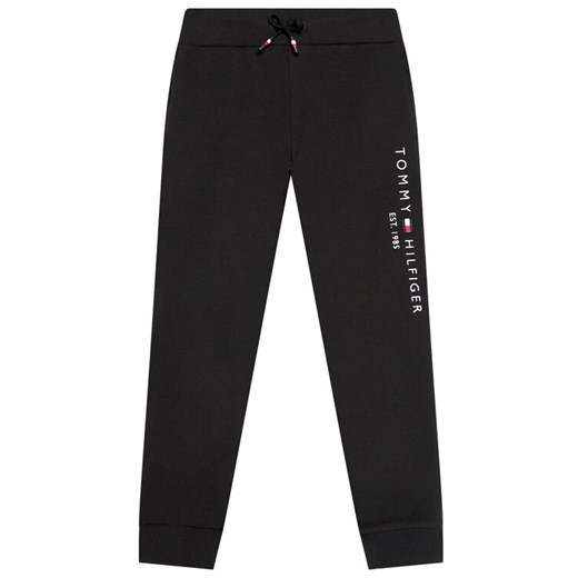 Tommy Hilfiger Spodnie dresowe Essential KS0KS00214 Czarny Regular Fit ze sklepu MODIVO w kategorii Spodnie chłopięce - zdjęcie 182623624