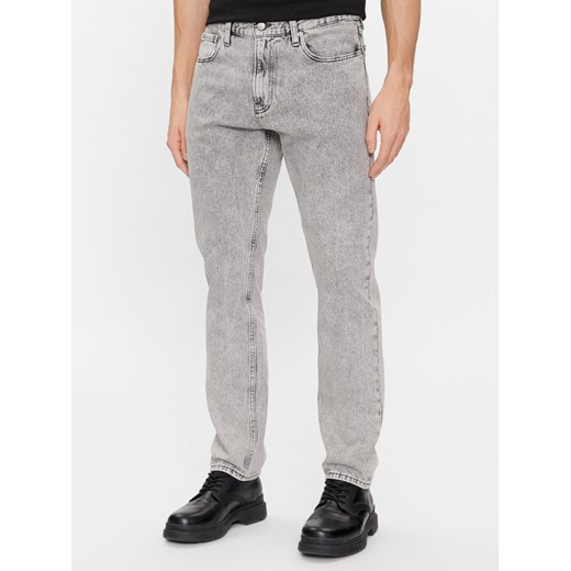 Calvin Klein Jeans Jeansy Authentic Straight J30J324563 Szary Straight Fit ze sklepu MODIVO w kategorii Jeansy męskie - zdjęcie 182624162