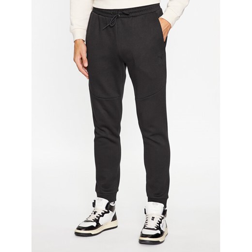 Puma Spodnie dresowe Pumatech 538286 Czarny Regular Fit ze sklepu MODIVO w kategorii Spodnie męskie - zdjęcie 182624810