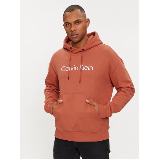 Calvin Klein Bluza Hero K10K111345 Pomarańczowy Relaxed Fit ze sklepu MODIVO w kategorii Bluzy męskie - zdjęcie 182624904