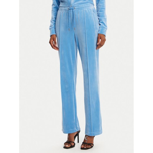 Juicy Couture Spodnie dresowe Tina JCAPW045 Niebieski Regular Fit ze sklepu MODIVO w kategorii Spodnie damskie - zdjęcie 182624940